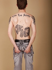 Tall skinny tattooed Pete Crash blows his load onto tummy.