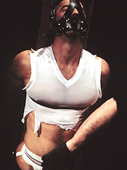 Bondaged hunk gets nipple and cock torture
