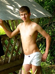 Slim gorgeous boyish Twink outdoor posing