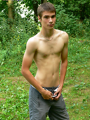 Cute gay boy strips outdoors and plays with his sexy cock as it gets nice and hard